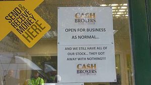 The defiant sign put up after the raid