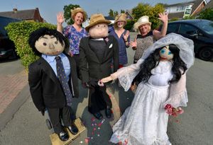 SHREW COPYRIGHT SHROPSHIRE STAR STEVE LEATH 11/08/2020..Pic in Pontesbury, where one resident made a little man (Jeremy) to cheer people up and displayed him in the street, then another neighbour made him a little girlfriend (Jessica), then another neighbour made Tom the Vicar, so they could get married. Neighbours: Paula Korsak,  Lorna Lewis, Elaine Cooper ..