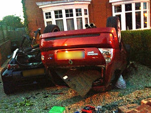 Supporting image for story: Car rolls over parked vehicle in Stourbridge smash