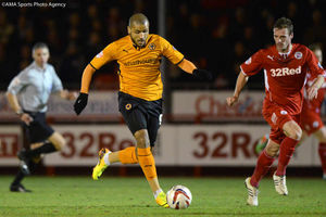  Leon Clarke of Wolverhampton Wanderers and Andy Drury of Crawley Town.
