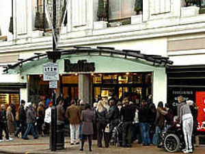 Supporting image for story: Shoppers in sales rush