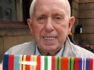 Supporting image for story: Trevor wears his wartime medals with pride