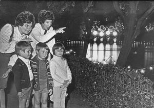 September 10, 1975, Walsall Arboretum lights. Karl Jones, aged five, Simon Hope (5) and Jonathan Slater were among the visitors. Pointing out some of the attractions are Mrs Pauline Hope and Mrs Doreen Jones, both of Shelfield