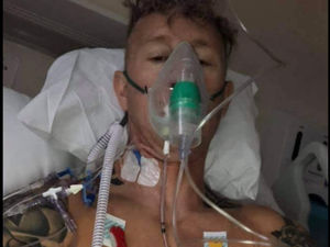 Supporting image for story: Community rallies for firefighter, 42, after 10-hour cancer op