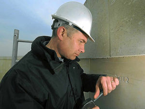 Supporting image for story: Engraver starts work on names of fallen heroes