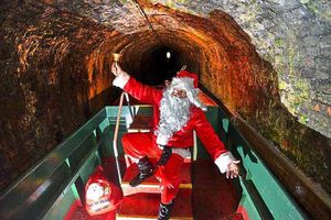 Santa trades in his sledge for a canal barge