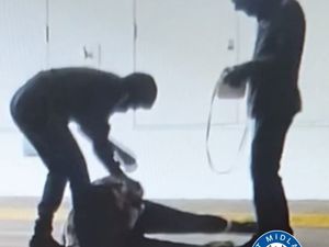 Supporting image for story: Image released in search for pair after woman 'pulled to floor' and robbed in Brierley Hill