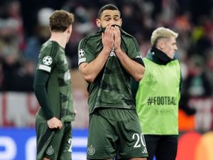 Celtic’s Cameron Carter-Vickers stands dejected after his side's 1-1 Champions League draw at Bayern Munich