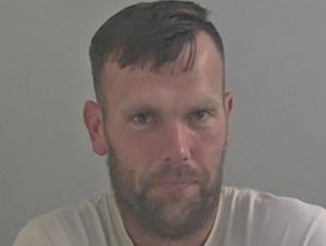 Supporting image for story: Violent robber sentenced to nine years for string of robberies at train station