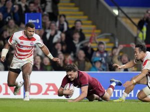 England’s George Furbank scores a try