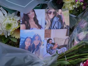 Photos of Bushey murder victims among flowers