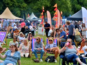 Supporting image for story: Foodies and fun lovers dashed for cover as thunderstorm rumbled over Shrewsbury Food Festival
