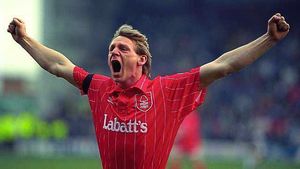 Former team-mate Stuart Pearce celebrates during his playing days at Nottingham Forest.