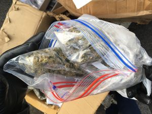 A quantity of cannabis was discovered amongst suspected counterfeit goods during the raid on a stall at Bescot Market in Walsall on Sunday, December 16. Photo by Gurdip Thandi LDR. Permission for use to all newswire partners.