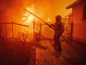 Supporting image for story: Five dead as wildfires burn out of control across Los Angeles area