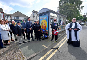 Rev. Mark Danks hosts the service at Shell Corner