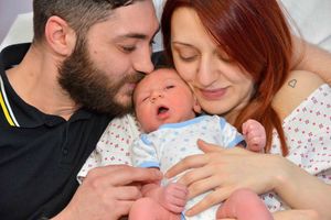 Adriana Niculescu with her baby: Darius and Dad: Catalin Negrila