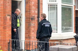 Police search a property in Birmingham. Photo: @SnapperSK