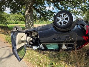 A car ended up on its roof after a crash near Mile End golf course, Oswestry. Photos: Ellesmere Fire Station