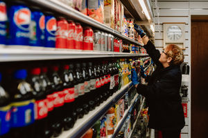 Sue Childs keeps the shelves stocked
