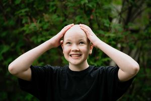Brooke Gamble, 12, after her head shave to raise funds for the Well