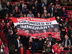 Supporting image for story: Man Utd fans display ‘MUFC proudly colonised by immigrants’ banner