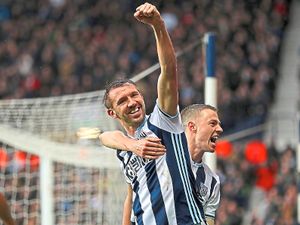 Supporting image for story: West Brom's Gareth McAuley is hot on the heels of Jonny Evans