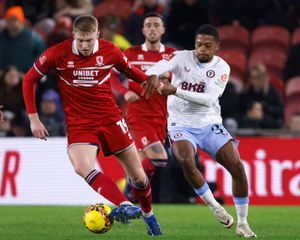 Middlesbrough's Josh Coburn and Aston Villa's Leon Bailey