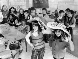 March 19, 1975: 'St Edmund's C. of E. School, in Beechwood Road, Dudley, celebrated the new building's first anniversary with an open night. Two eight-year-olds, Tracy Walker and Jane Round, are seen modelling to their classmates the Easter bonnets which they have made. The school moved from its old premises on Council Hill last year...'