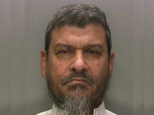 Supporting image for story: Sex abuse imam still on run from justice two years after trial