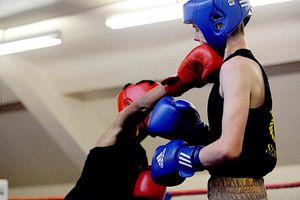 Take that - Lions' Mohammed Hussain sticks one on Stoke Staffs' Tom Stokes as he comes forward.