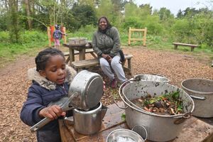 Three-year-old Xyon Telfer 3 and mom Natrai from Bushbury enjoy the new play area.
