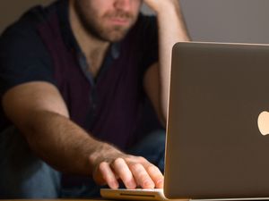 A man using a laptop