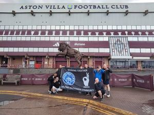 The group took pictures outside of each of the stadiums, including Aston Villa's Villa Park