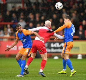 Mal Benning and Josh Ruffels battle for the ball. Picture: Tim Thursfield