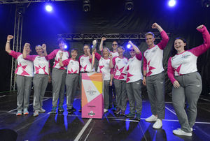 Baton-bearers for the Queen's Baton Relay, on stage at The Quarry