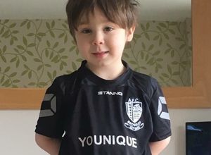 Zac when he was well, wearing a Broseley football club