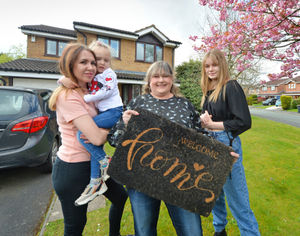 Host Pam Rogers with the family