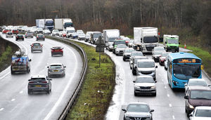 The crash has led to queueing traffic along the main road