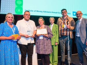 Supporting image for story: Debt advice team wins national award