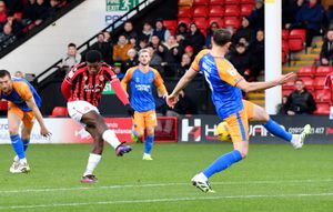 Daniel Kanu opened the scoring for Walsall with a rocket from 20 yards out.