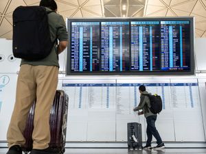 Supporting image for story: Schools shut and flights cancelled in China as strong typhoon approaches