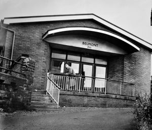 Belmont Hall at the top of New Street in September 1964. Handwritten on the back is: 'The £7,000 Belmont Hall, built for the Wellington old people's welfare committee with funds raised by public subscription and opened in 1961 by Lord Bradford. The hall will have to be demolished when the proposed redevelopment of Wellington is carried out because it stands in the middle of the central redevelopment area. 12/9/64.'