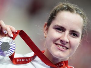 Supporting image for story: Daphne Schrager tells of ‘surreal’ moment Jackie Chan presented her silver medal