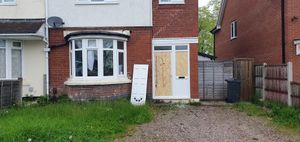 The door was boarded up later on Monday