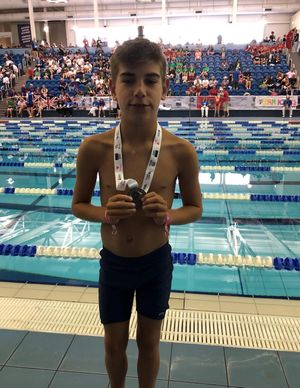 Oliver with his silver medal
