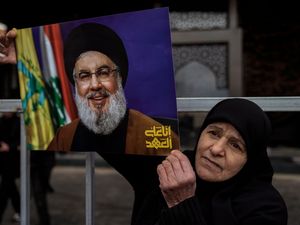 Supporting image for story: Thousands attend the funeral of Hezbollah leader months after his death