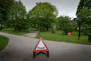A sign warning of flooding in Severn Park