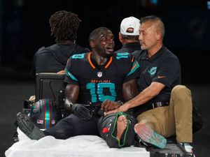 Supporting image for story: Miami Dolphins top New York Jets 27-21 but lose star Tyreek Hill to leg injury