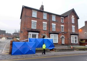 The police cordon which remains in place at the flat in Wolverhampton Road, Stafford. Credit: Steve Leath/Express & Star